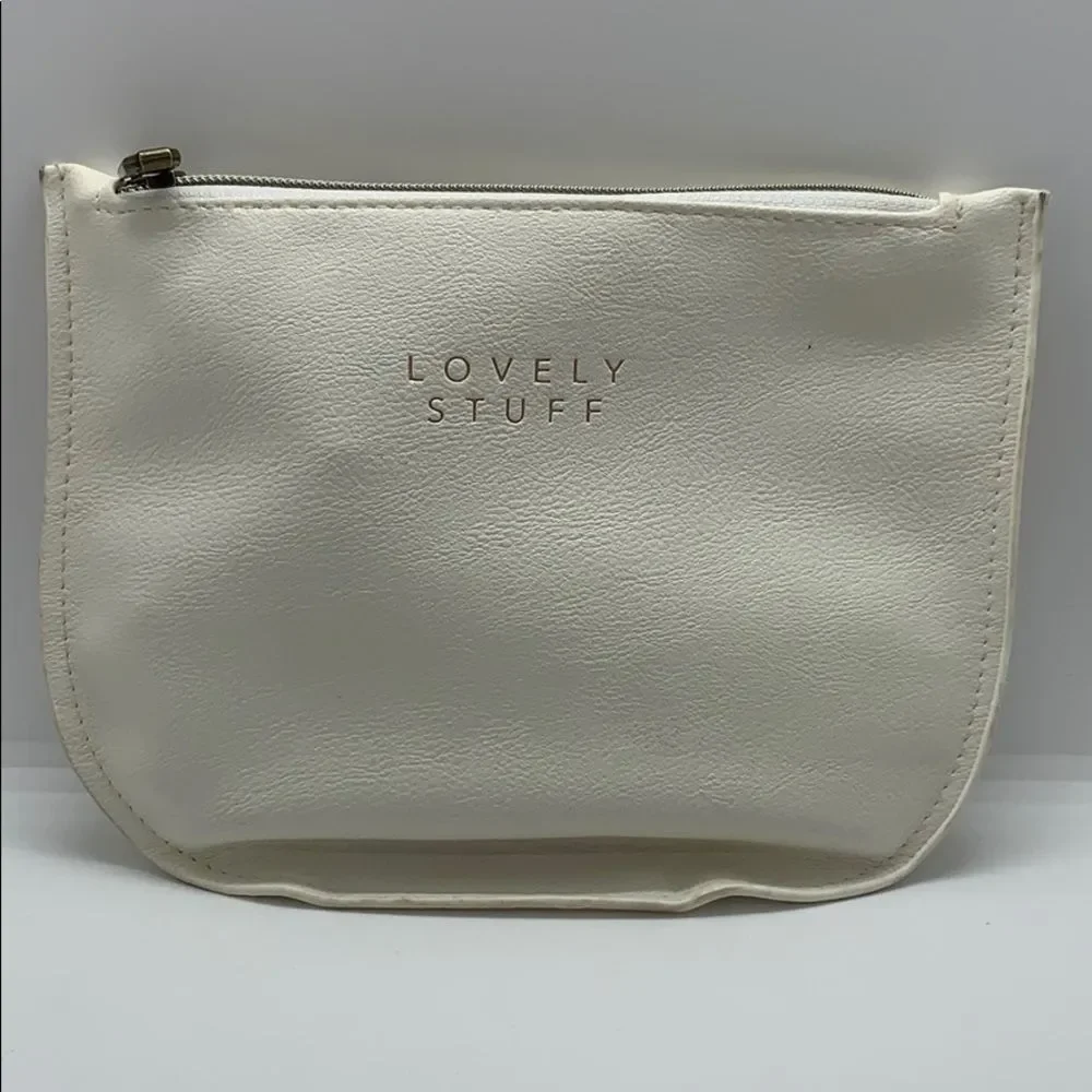 NWOT Lovely Stuff Cream Leather Cosmetic Bag